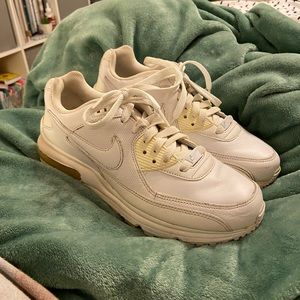 white nike airmax with yellow detail